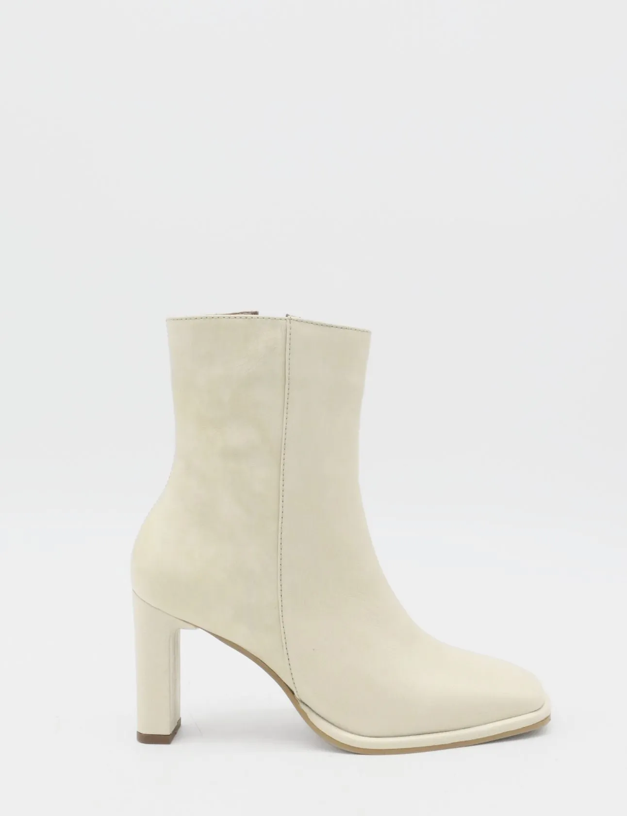 Indigo heeled ankle boots in off white leather womens shoes